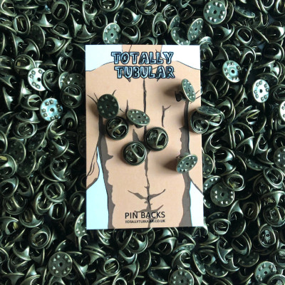 Antique coloured metal pin badge backs