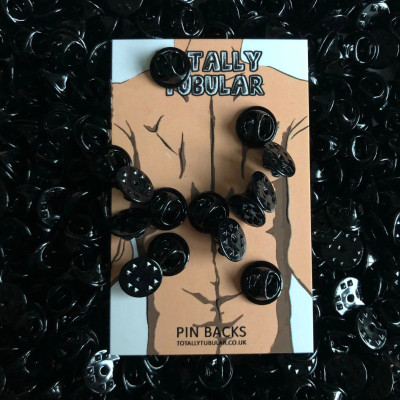 Black coloured metal pin badge backs