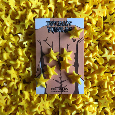 Yellow Star shaped rubber pin badge backs
