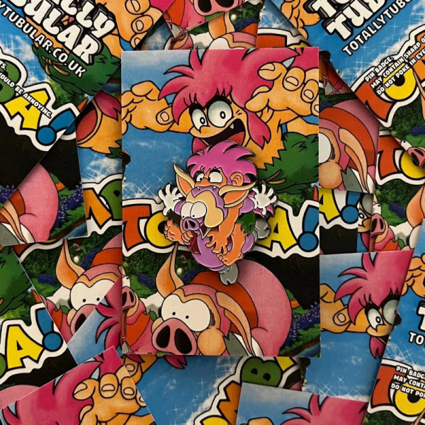 TOMBA! - Tomba Leaping on a Pig enamel pin badge