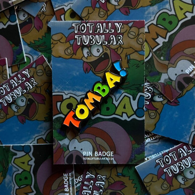 TOMBA! Logo enamel pin badge