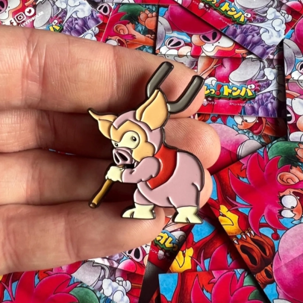 TOMBA! Koma Pig enamel pin badge
